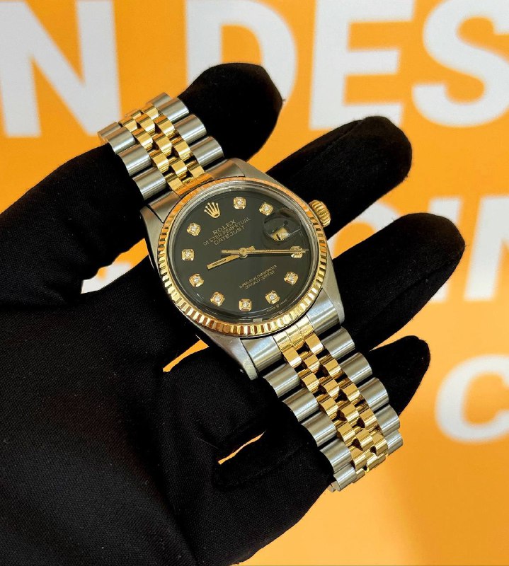 Rolex Datejust 36 36mm black diamond dial yellow gold and stainless steel jubilee bracelet box appraisal